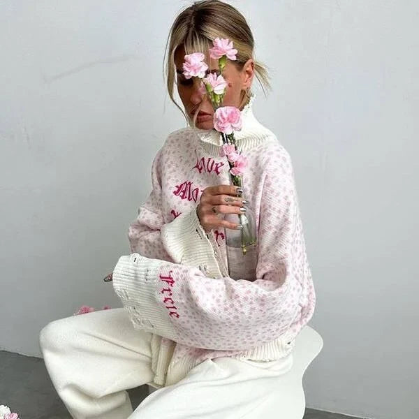 A stylish embroidered patchwork sweater, perfect for keeping warm during the cooler Kiwi months.