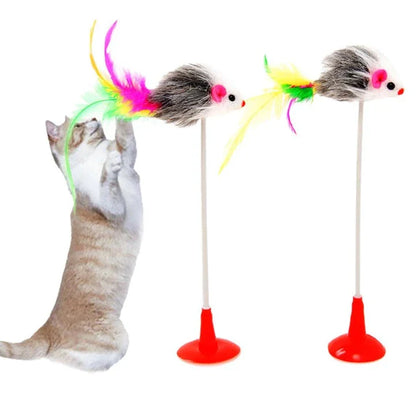 The Interactive Cat Toy Feather with a green feather and sturdy plastic ball, designed to engage cats in energetic play and satisfy their natural hunting behaviours.