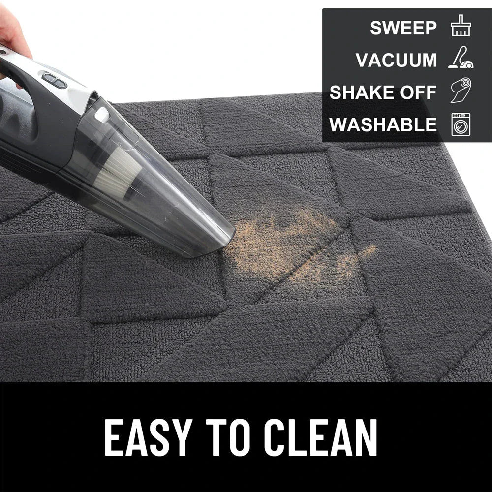 Geometric non-slip microfibre door mat in various sizes, featuring an elegant pattern and durable construction for a clean, stylish entryway.