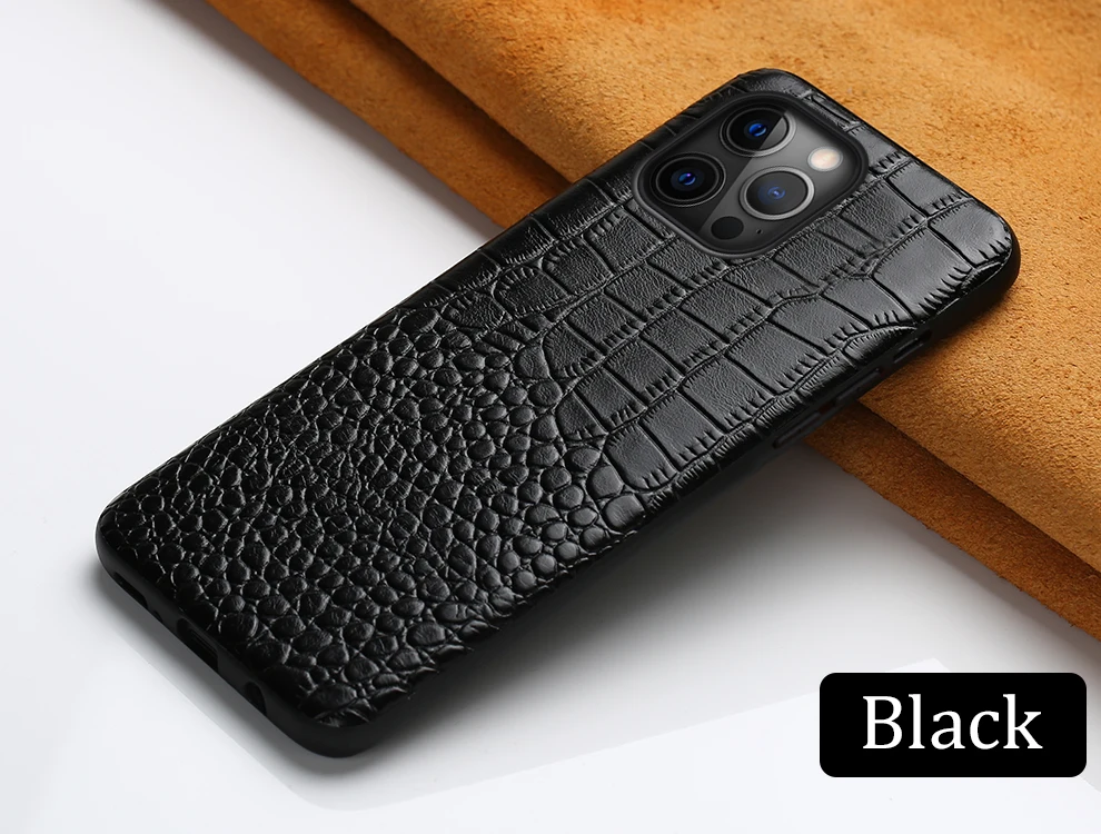 Durable leather iPhone case with shock-absorbing frame, elevated camera cover, and oleophobic coating for premium protection