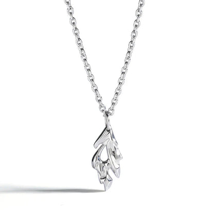 A silver charm pendant with an intricate design, perfect for the modern Kiwi bloke's fashion needs