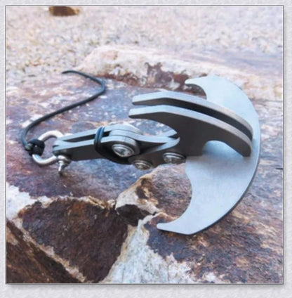 Sturdy stainless steel grappling hook with gravity-powered jaws, designed for outdoor adventures and survival in New Zealand